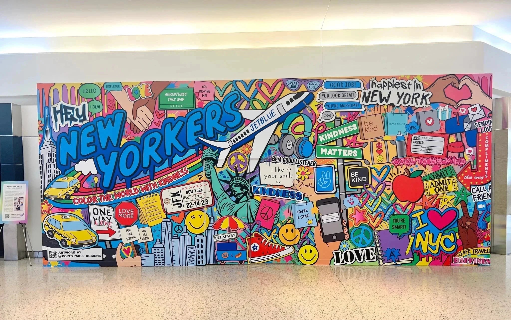Colorful mural with New York-themed graphics in an indoor setting