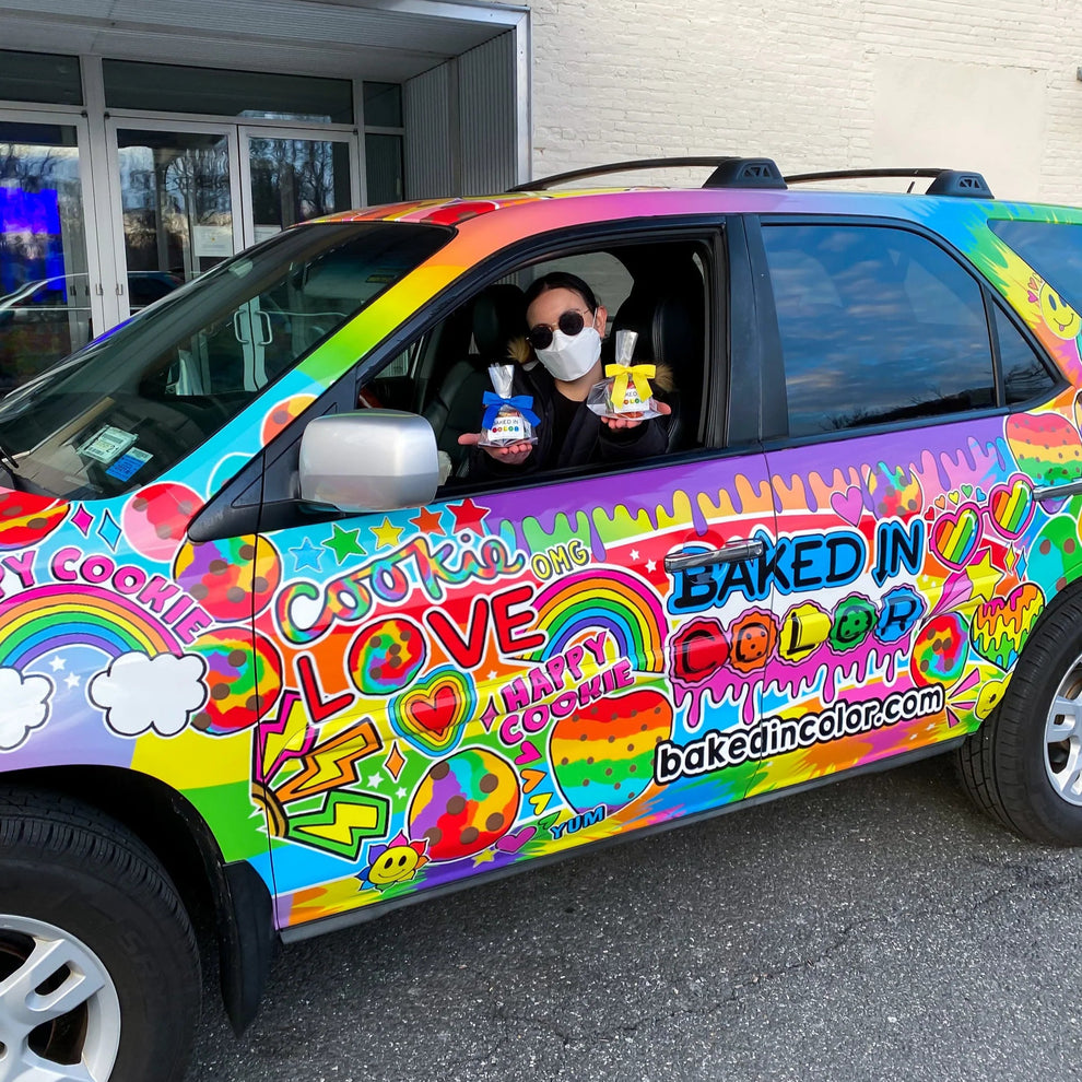 Bright, colorful car selling cookies.