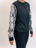 Load image into Gallery viewer, Snakeskin Sleeves Cropped Crew Neck Sweatshirt
